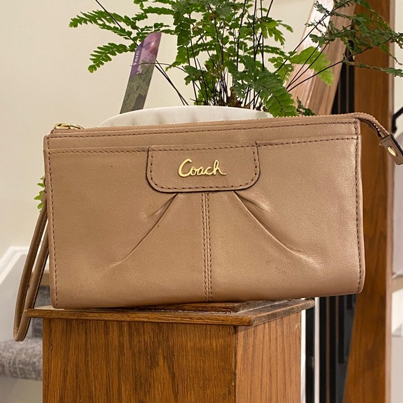Coach Handbags - Coach Beige Wristlet Clutch